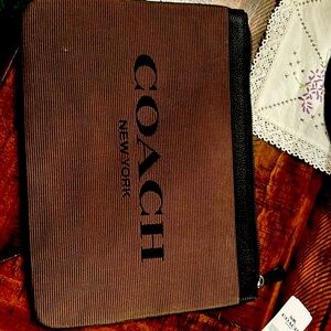 Coach clutch brand new with tags.